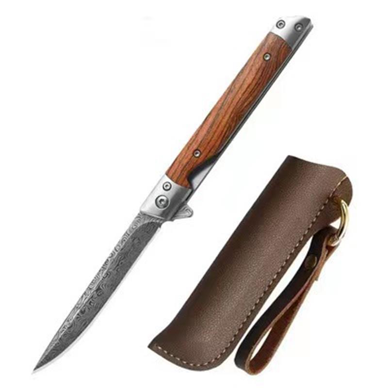 Open folding knife with a slim Damascus-pattern drop-point blade and striped wood handle beside a brown leather sheath with brass ring, on a white background