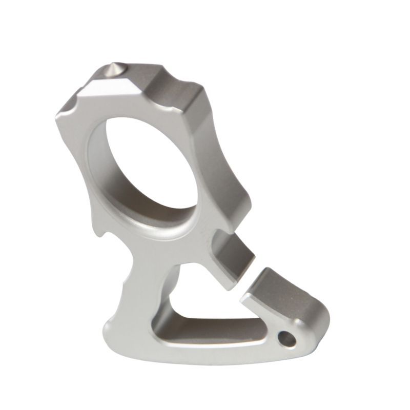 304 stainless steel single-hole bottle opener knuckle duster standing upright on white background.
