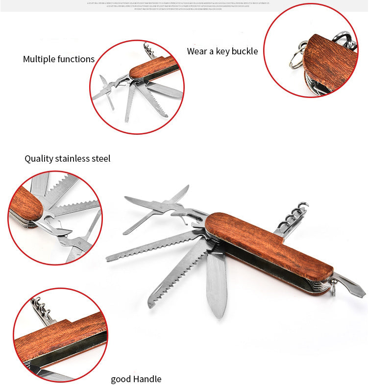 Angled folding multi-tool open with a screwdriver tip, saw blades, scissors and corkscrew spread from the handle