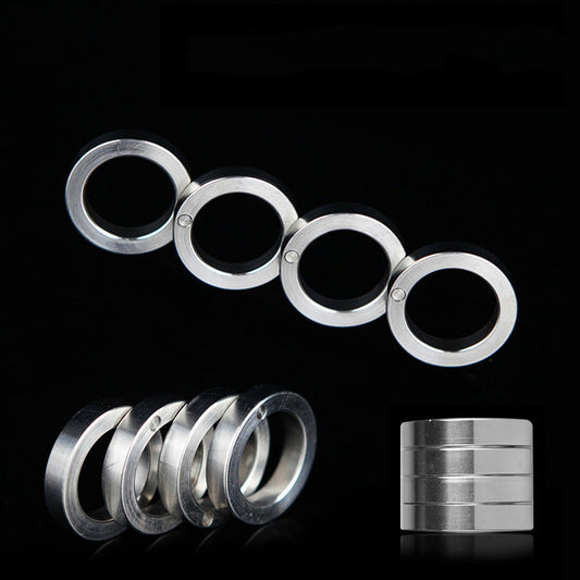 Composite of the stainless steel four-ring knuckle on a black background, unfolded row above, angled stack and folded cylinder below