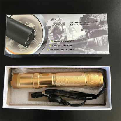Gold 910A unit in the white inner tray with the black wall charger and wrist strap inside the 910A retail box