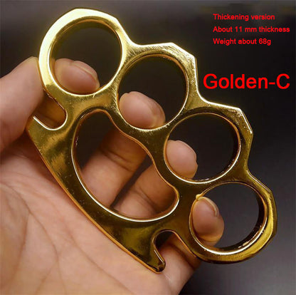 Golden-C aluminum knuckle duster held in hand with thickening version and 68 g text overlay