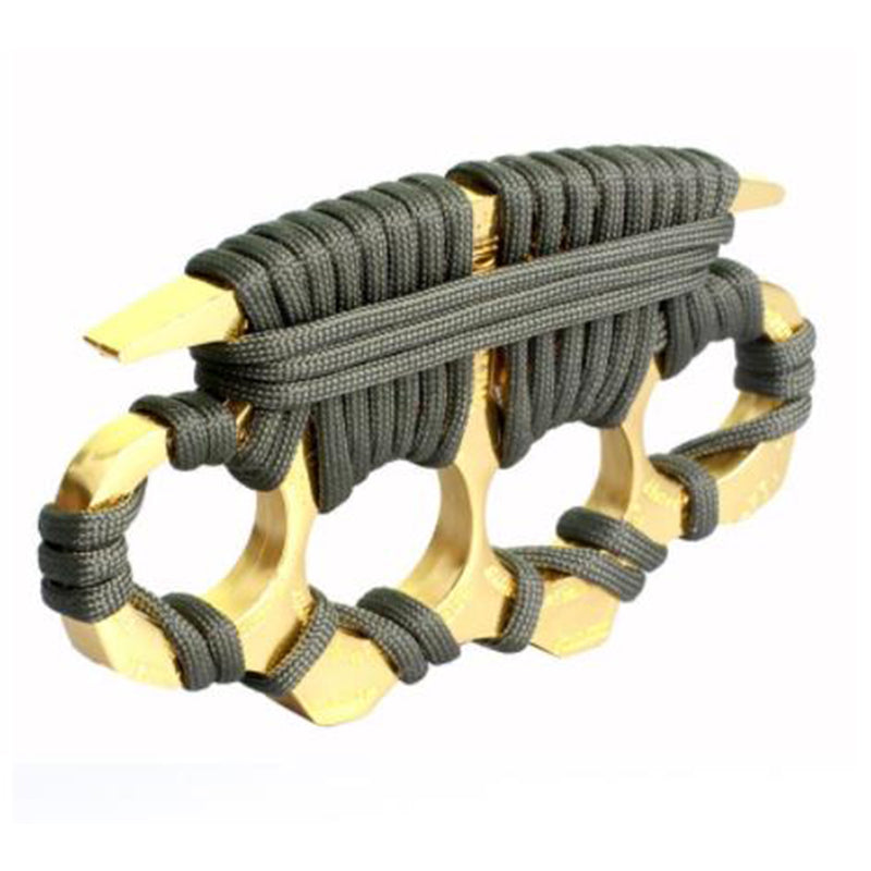 A golden zinc alloy knuckle duster wrapped in olive-green paracord, shown at a slight angle on a plain white background.