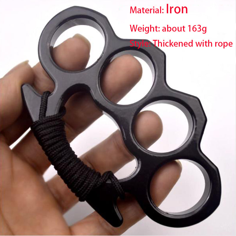 Black thickened iron knuckle duster with a rope-wrapped handle held in an open hand