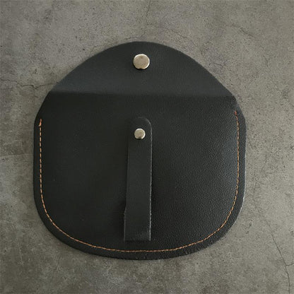 Rear panel of the black leather case with a slim snap-closed leather strap running down the center
