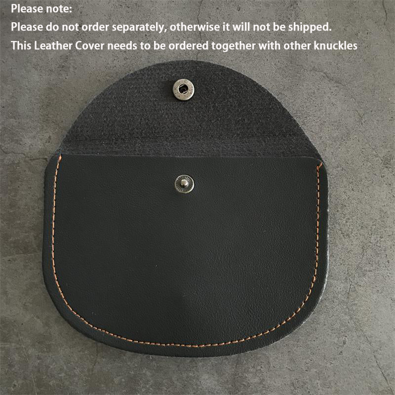 Knuckle dusters leather case with the flap lifted, showing the suede underside, snap socket and body stud