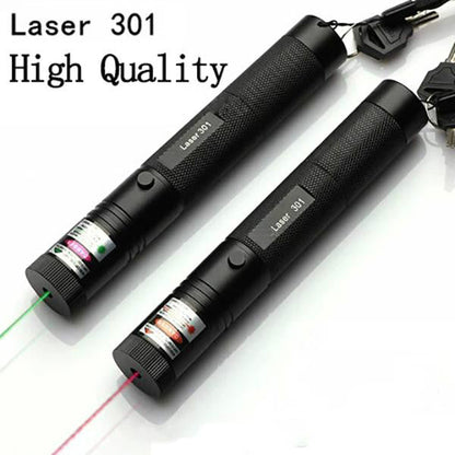 Two laser pointer pens side by side, one throwing a green beam and one a red beam