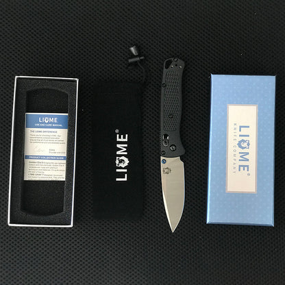 Full Liome 535 kit laid out with care manual in inner tray, black drawstring pouch, open knife and outer box
