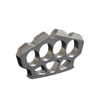 Three-quarter view of the maple leaf shaped stainless steel knuckle duster on white background.