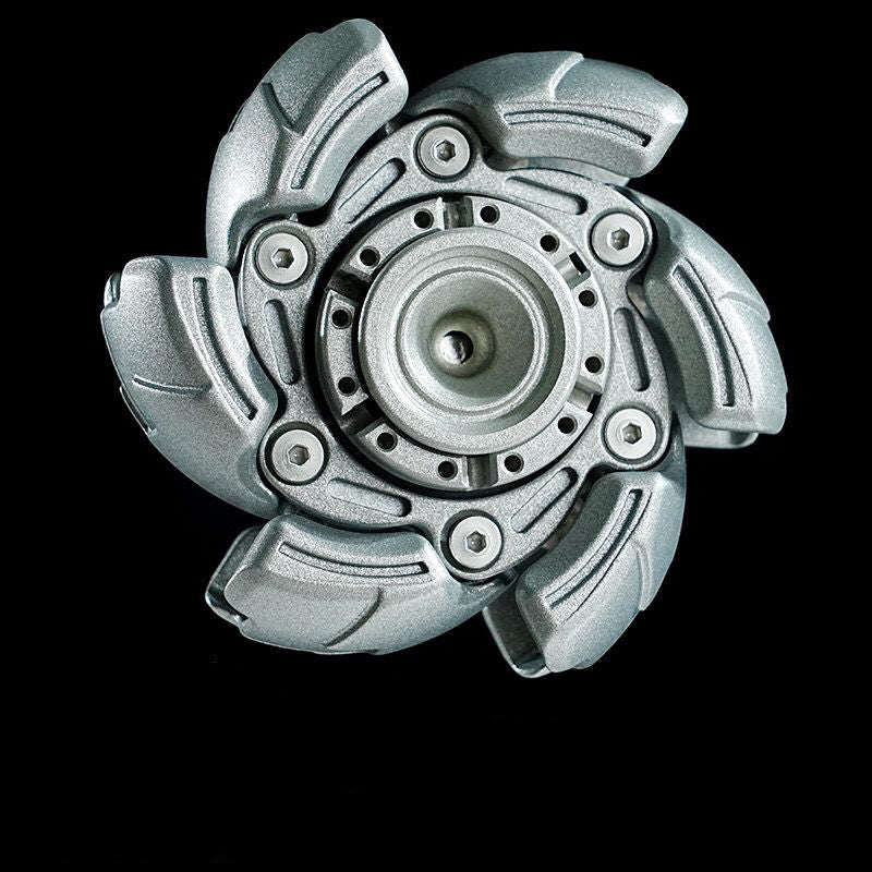 Folded and unfolded comparison of the open metal fidget toy side by side