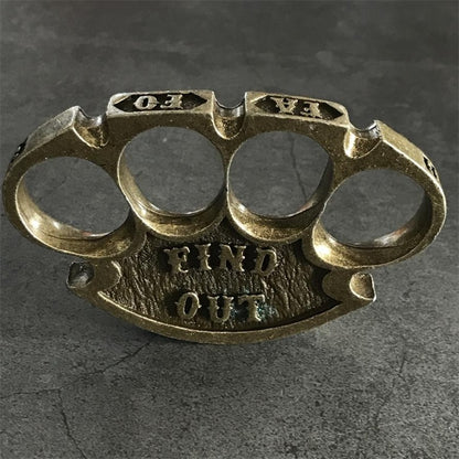 Angled top view of the antique copper retro knuckle duster showing vintage textured grip face