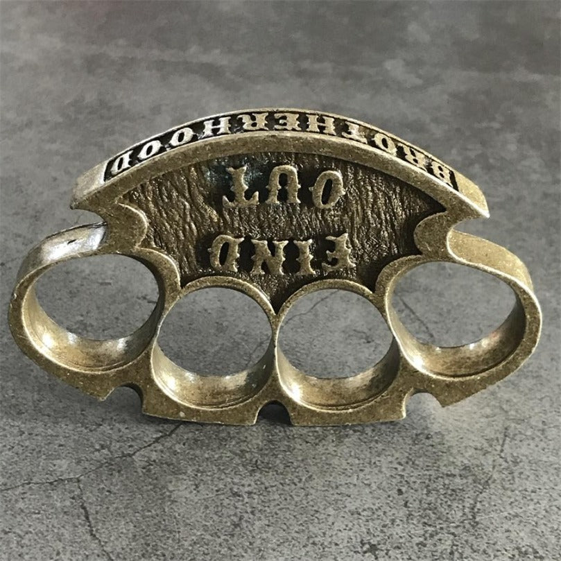 Rear top view of the antique copper retro knuckle duster showing FIND OUT and BROTHERHOOD lettering
