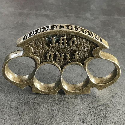 Rear top view of the antique copper retro knuckle duster showing FIND OUT and BROTHERHOOD lettering