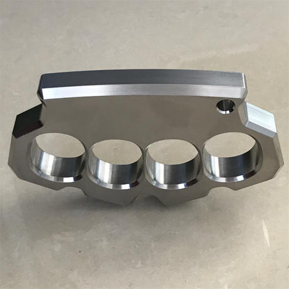 Rear view of the mirror polished four-hole stainless steel duster standing on its edge.