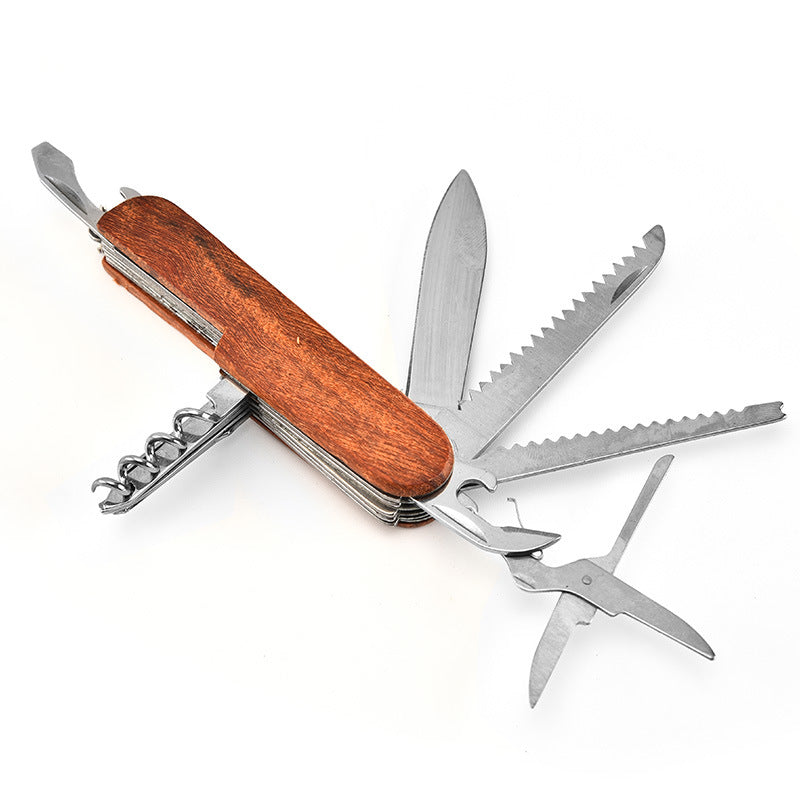 Function chart of the folding multi-tool with close-up circles showing the key ring, corkscrew and folded tools