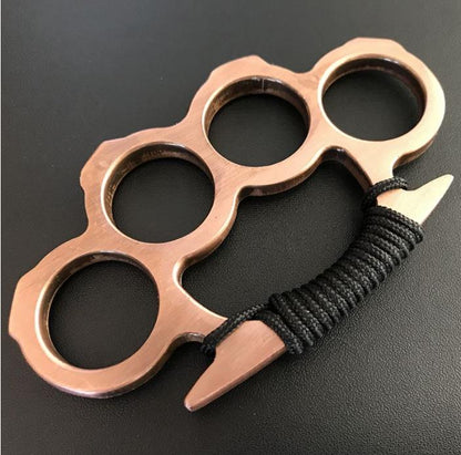 Rose gold copper knuckle duster with black paracord grip