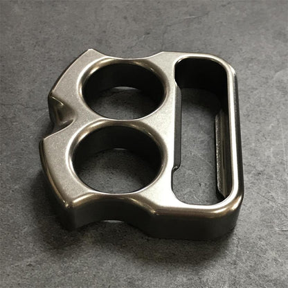 Oblique grip view of titanium duster showing chamfered side wall