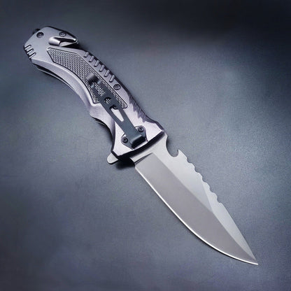 Open folding knife showing pocket clip and textured metal back handle