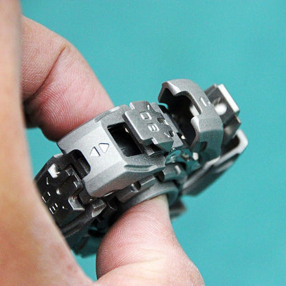 Open stress relief toy held in a hand for scale to show its compact pocket-friendly size