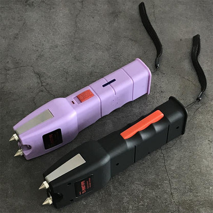 Side view of purple and black units showing the red slide switch with status dot and the chrome triangular head plate