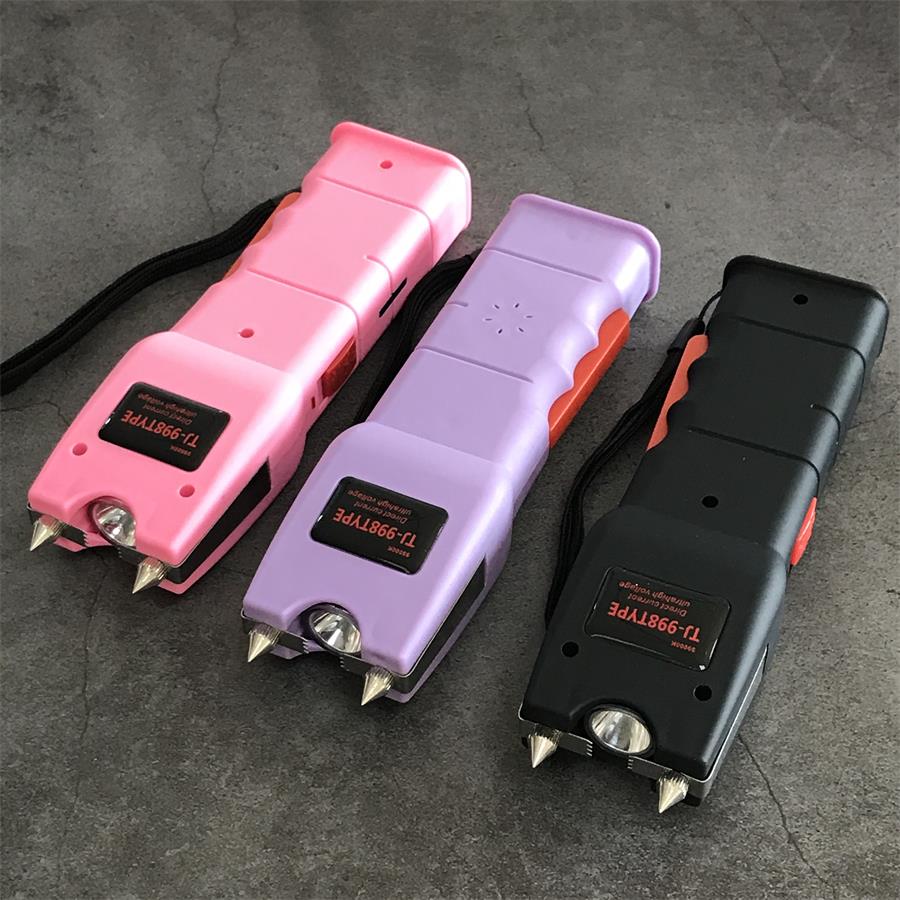 Pink, light purple and black 998 units in a row showing the head LED lens between the electrode pins and orange grip ribs