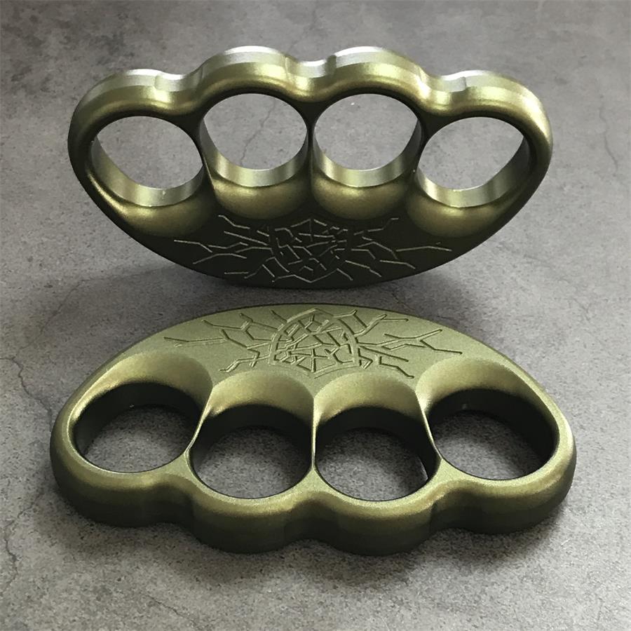 Pair of olive dusters laid flat showing crest and finger holes