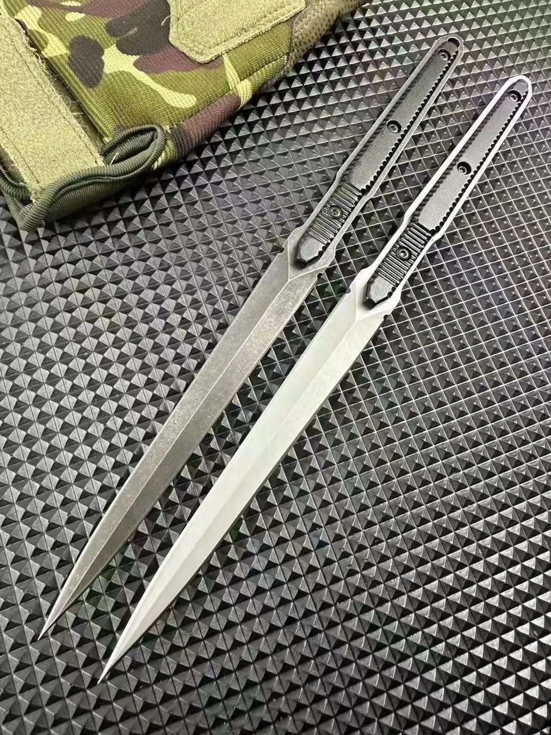 Two bayonets and two sheaths arranged across a grey textured mat