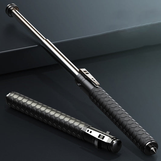 Extended and closed pen-shaped batons with hexagon-textured black handles and a steel tip on a dark blue-grey surface