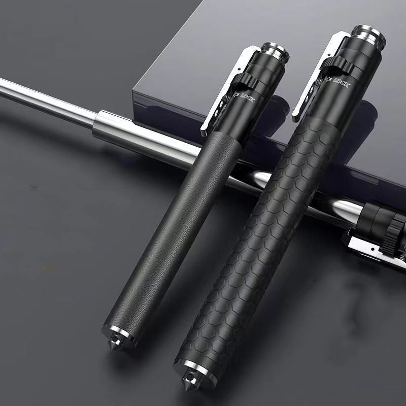 Two closed pen-shaped batons side by side with leather-grain and hexagon handles, extended steel sections in the background