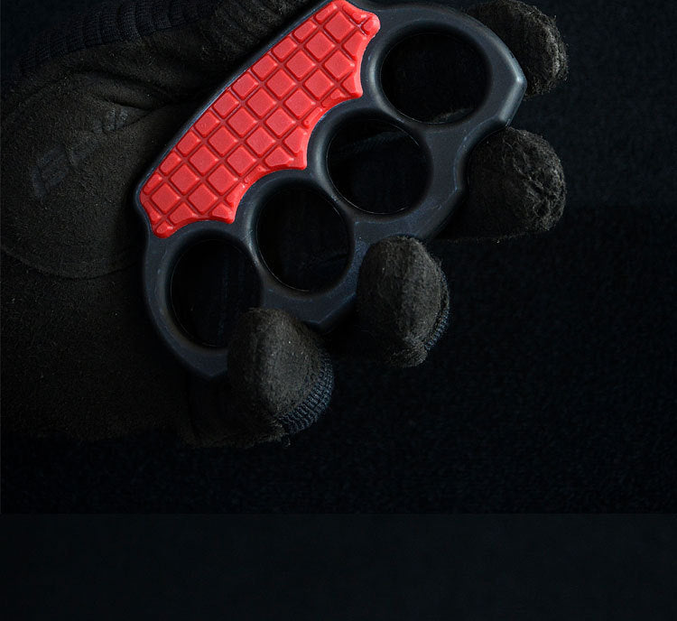 Brown-black knuckle duster with a tan body and black grid palm panel on a white background