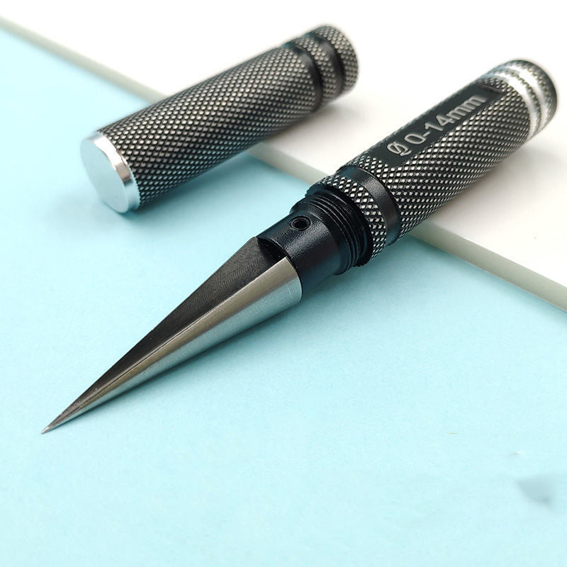 Tapered reamer tool with polished steel cone tip and black knurled handle, shown at a three-quarter angle.