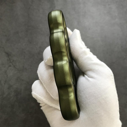 Full side profile showing scalloped silhouette of olive duster