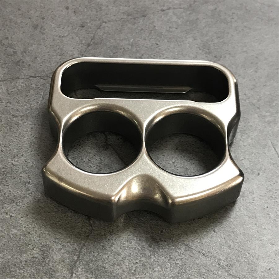 Side profile of titanium duster standing on edge showing wall thickness