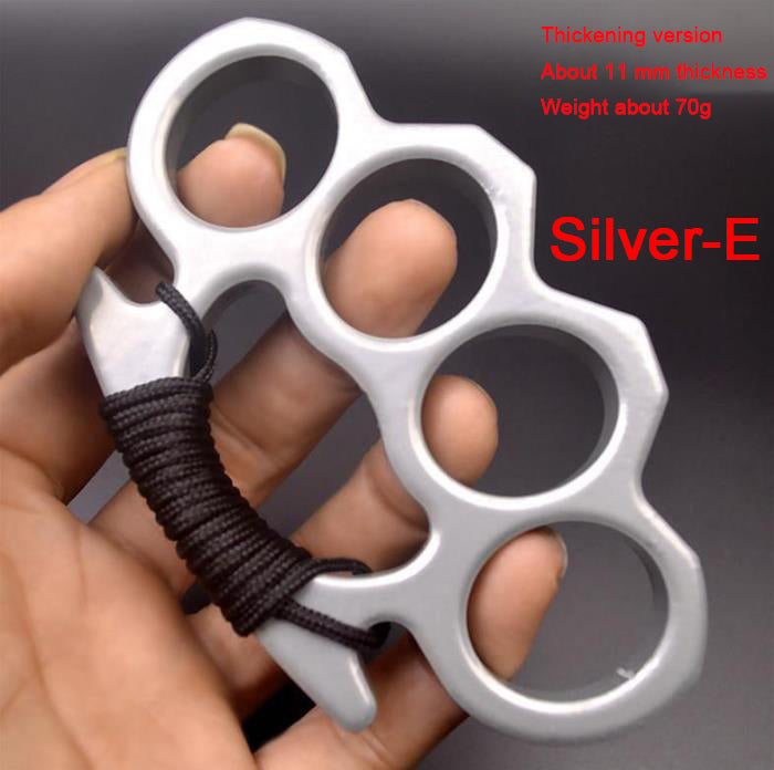Silver-E aluminum knuckle duster held in hand with thickening version and 70 g text overlay, alternate view