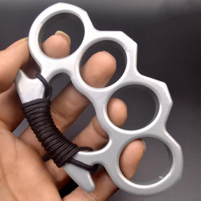 Silver-B aluminum knuckle duster with paracord held in hand