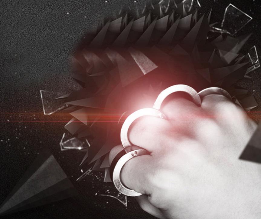 Close-up of the four-ring steel piece worn across the knuckles against a dark red-lit backdrop with shattered glass effects