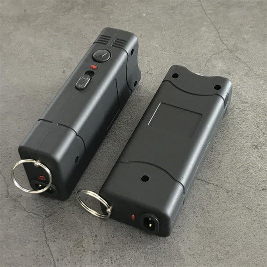 Black 801C stun guns shown from both sides with the control buttons, charging port and keyring visible