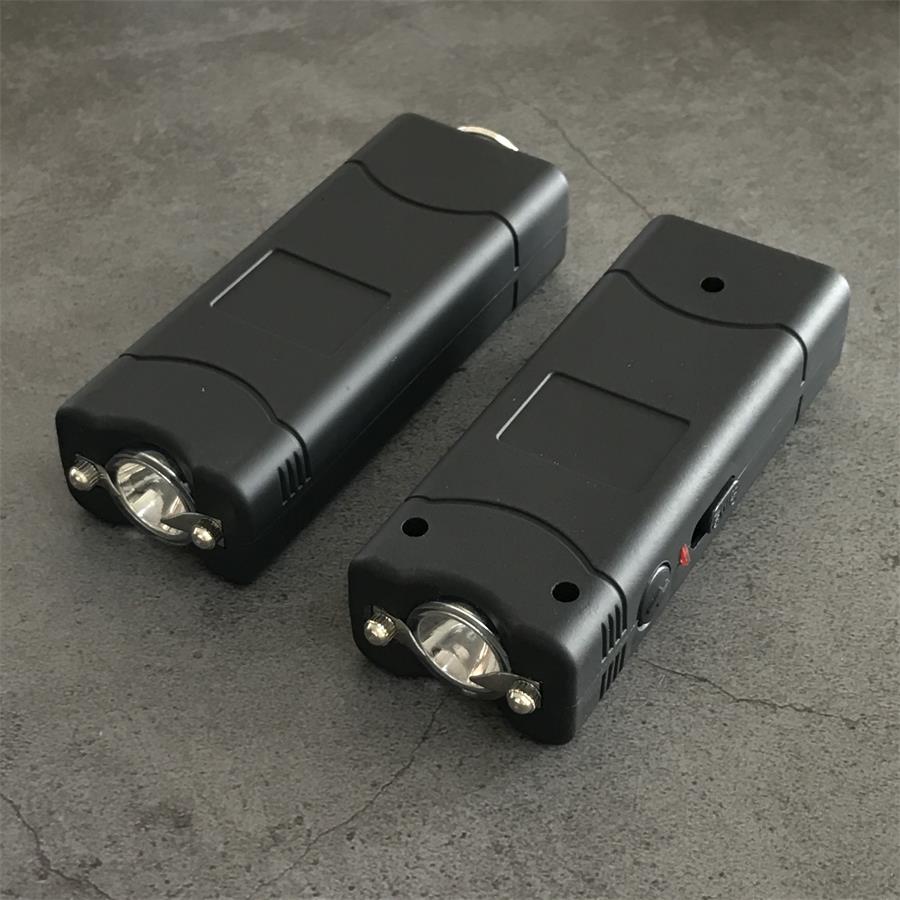 Black 801C stun guns shown head-on with the light reflector and electrode pins in view