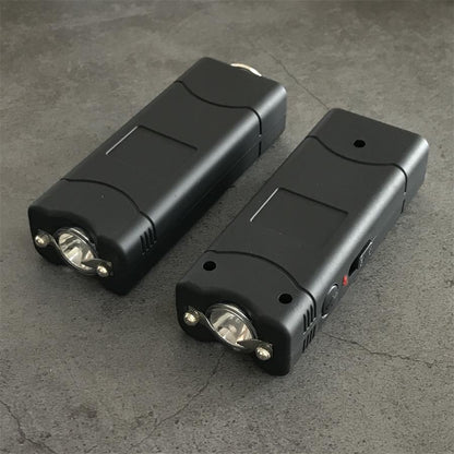 Black 801C stun guns shown head-on with the light reflector and electrode pins in view