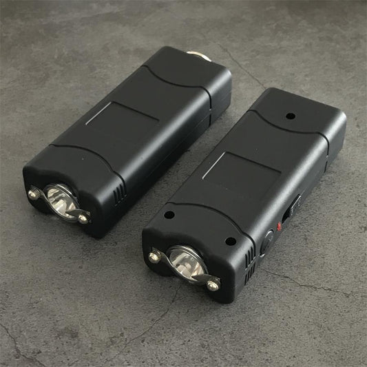 Black 801C stun guns shown head-on with the light reflector and electrode pins in view