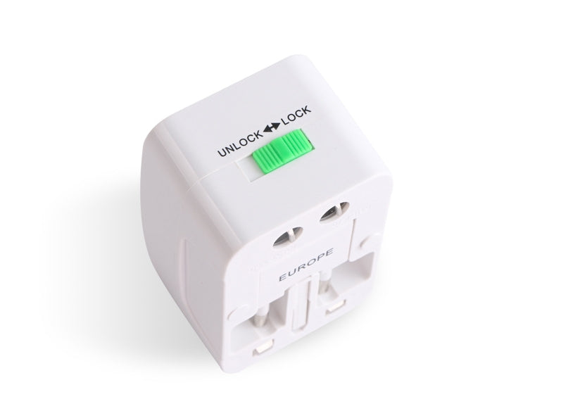 Top-down view of the white travel adapter showing the green unlock lock slider and the EUROPE side fold-out pin mechanism