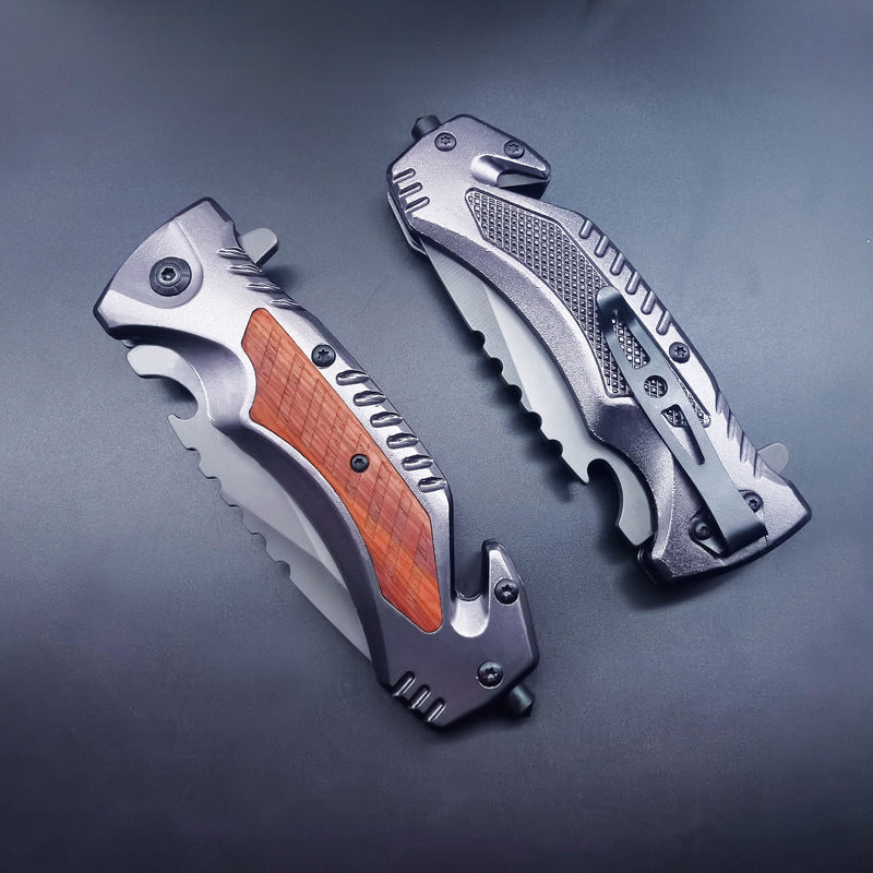 Two closed multifunctional folding knives showing wood inlay and textured metal back with pocket clip