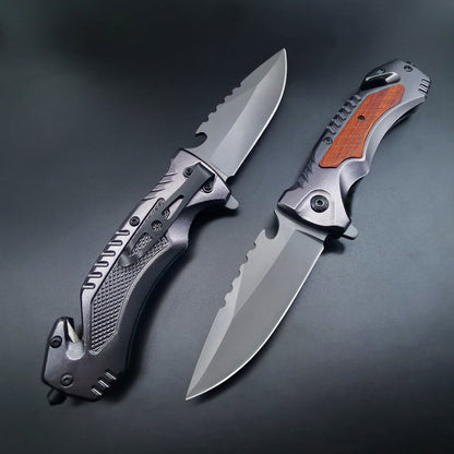 Two open multifunctional folding knives on dark background