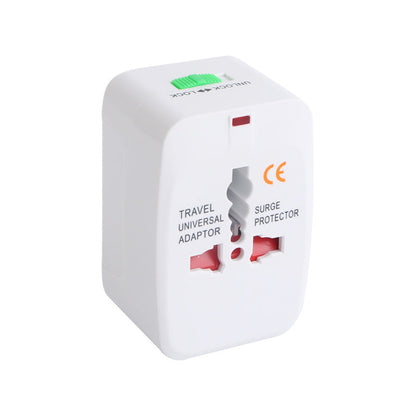 Front view of the white travel universal adapter with orange CE mark, red indicator dot and green unlock slider on a plain white background