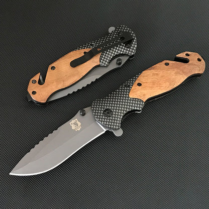 Folded X50 knife with black pocket clip beside an open X50 showing the wooden handle and sawback blade